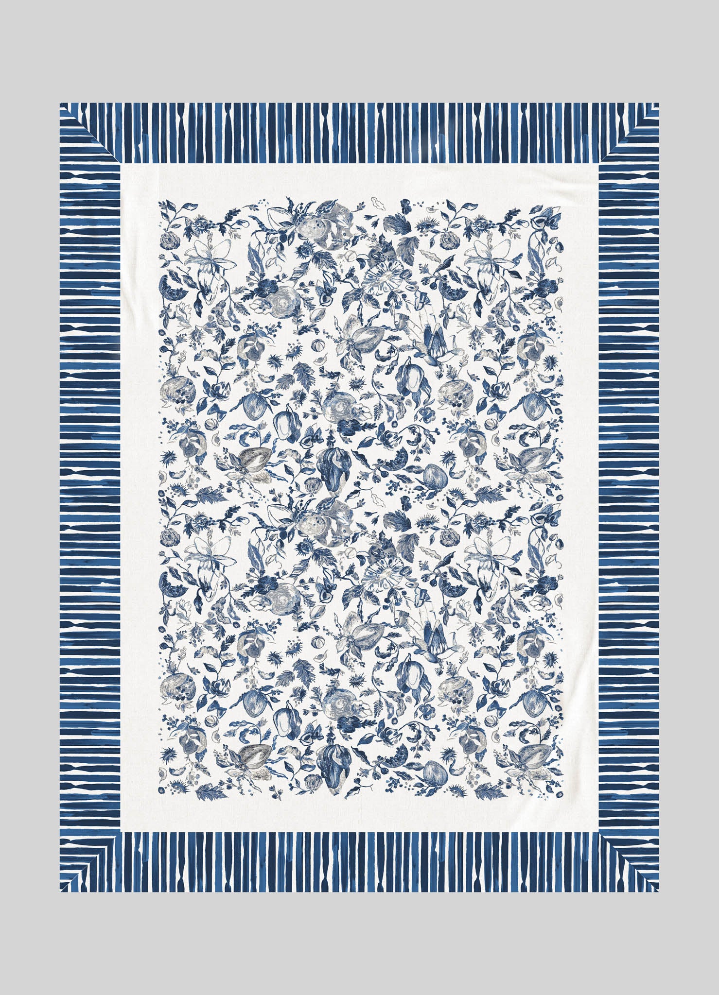 A rectangular textile with a floral print featuring various flowers and foliage in shades of blue on a white background, bordered by a geometric striped pattern in matching blue tones.