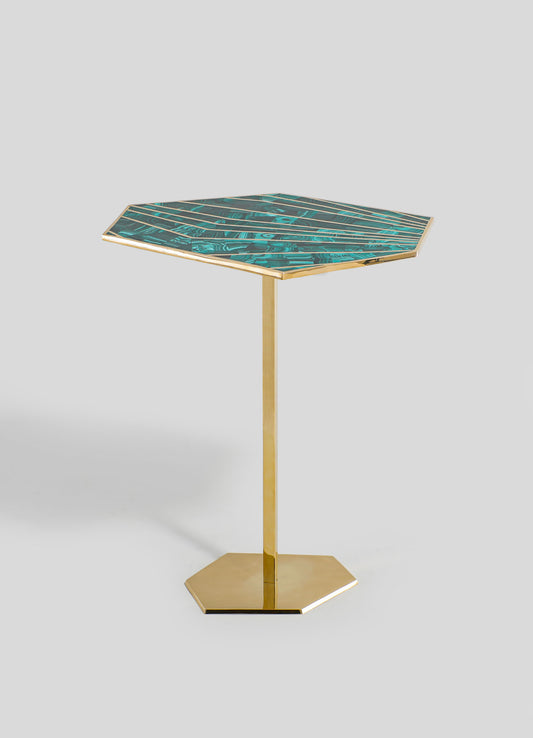 A side table with a square top featuring a turquoise and black marbled pattern, framed by a metallic gold edge, supported by a gold metal pedestal base on a flat hexagonal gold platform.