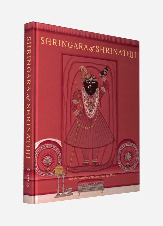 A hardcover book with a red cover featuring an illustrated icon of a Hindu deity in traditional attire, adorned with jewelry and holding a staff, set against a stylized background.