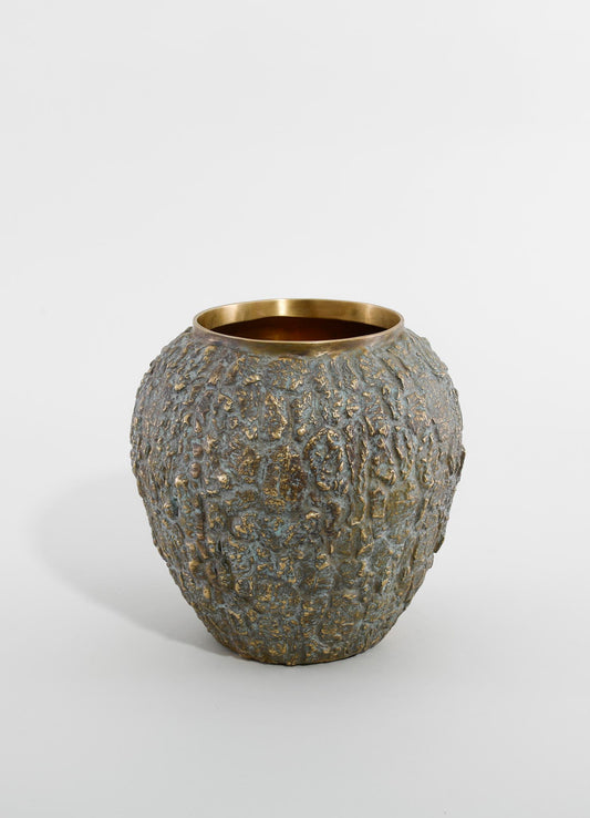 A ceramic vase with a textured, uneven surface and a metallic gold interior finish. The exterior has a dark, earthy tone with irregular, organic patterns, suitable for rustic or contemporary decor.