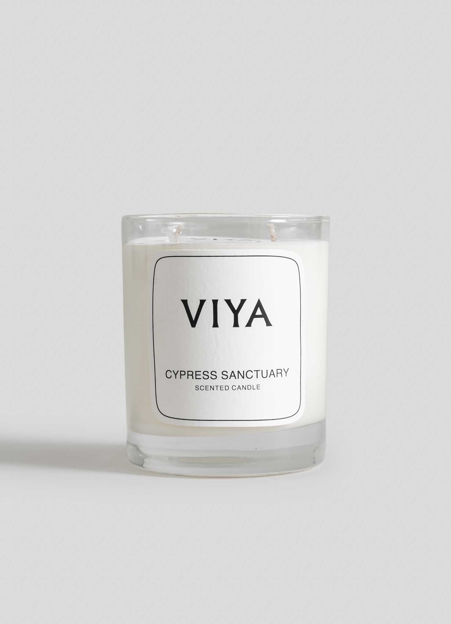 VIYA Cypress Sanctuary scented candle on a light gray background viya luxury wax candle