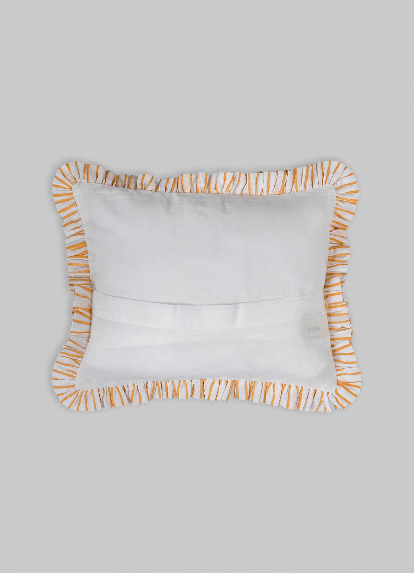 Decorative rectangular cushion with white fabric and orange striped ruffled border.
