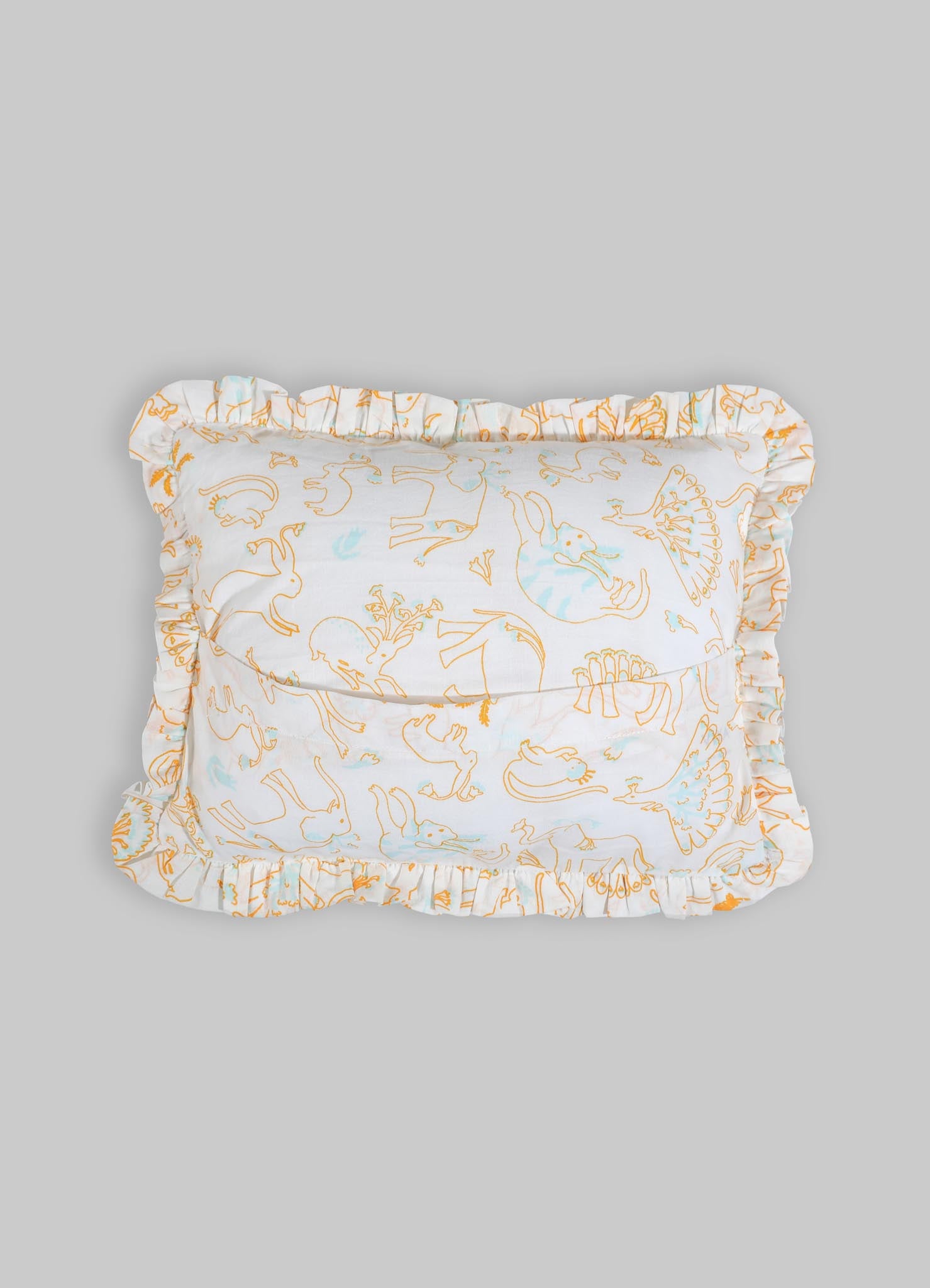 Cotton pillow with a whimsical dinosaur print in orange and light blue, featuring a ruffled border around the edges.