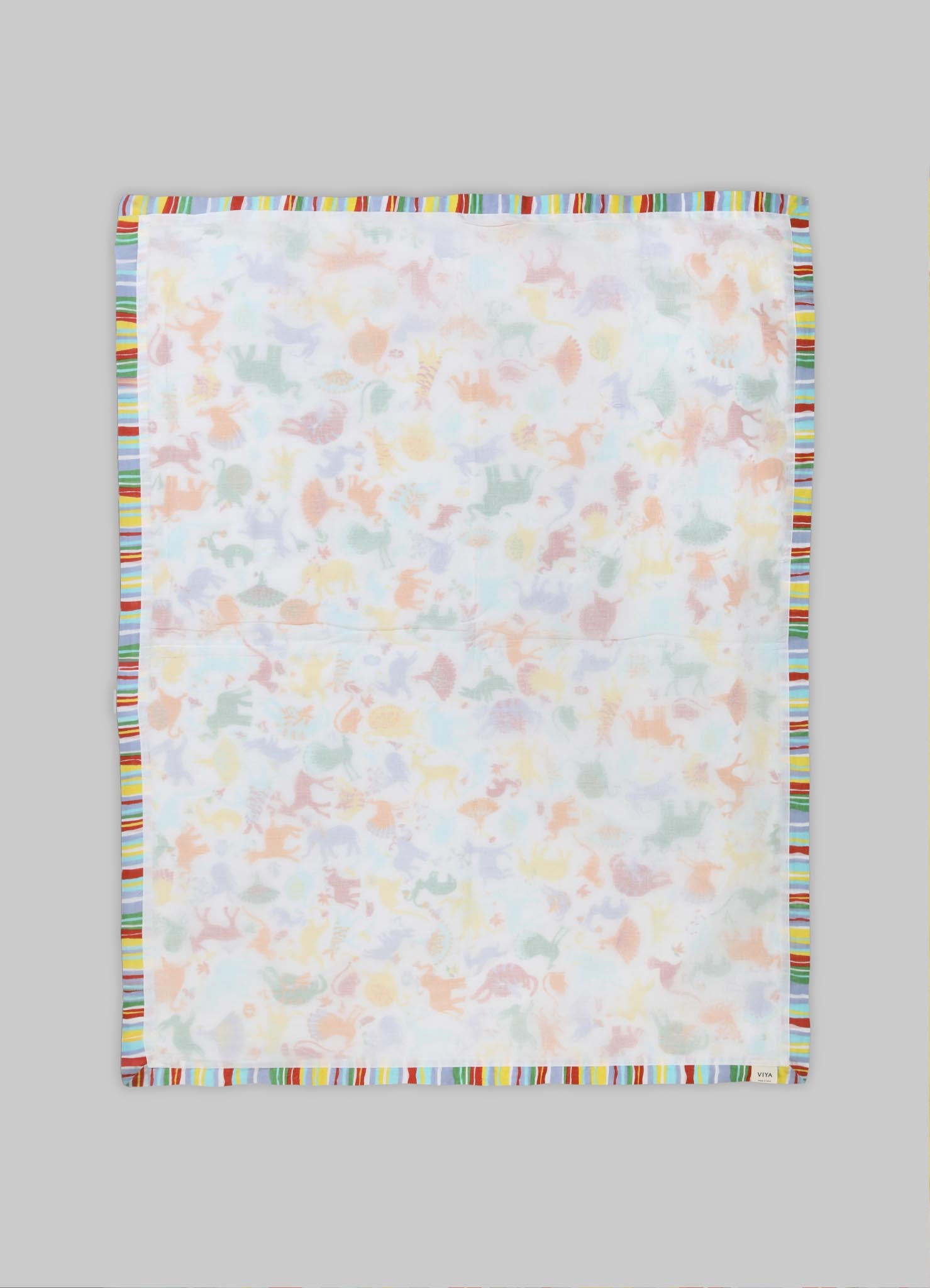 A square textile with a pattern of pastel-colored animal motifs, bordered by a multicolored striped trim. The fabric appears lightweight and soft, suitable for use as a handkerchief, scarf, or decorative cloth.