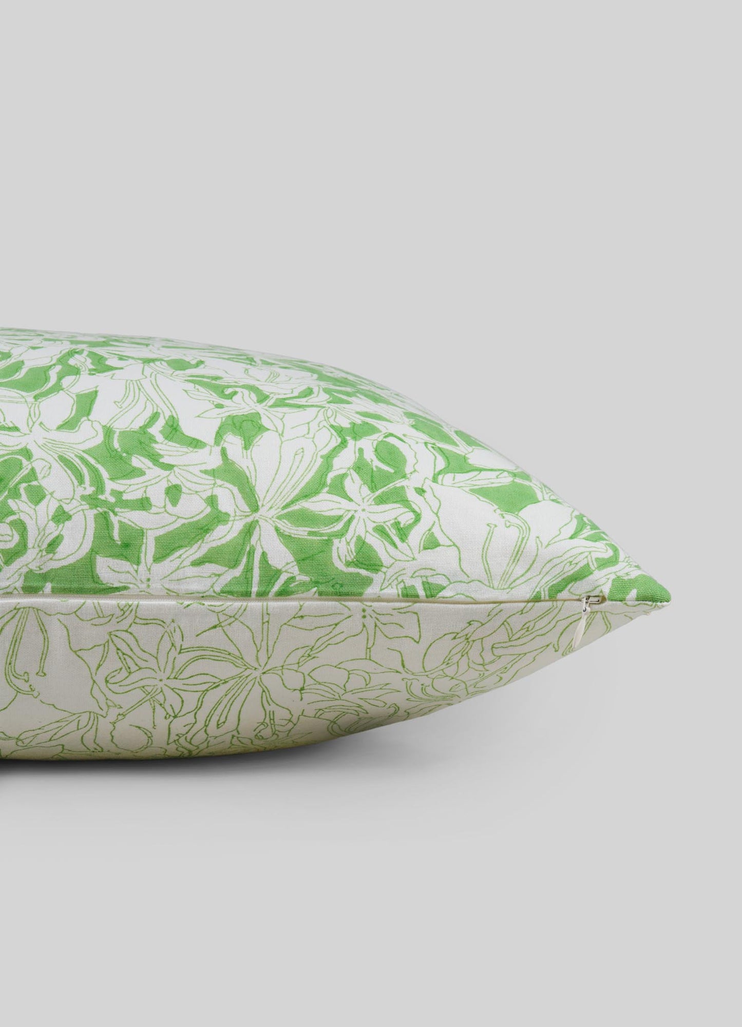 Green and white floral patterned pillow cover on a light gray background luxury viya