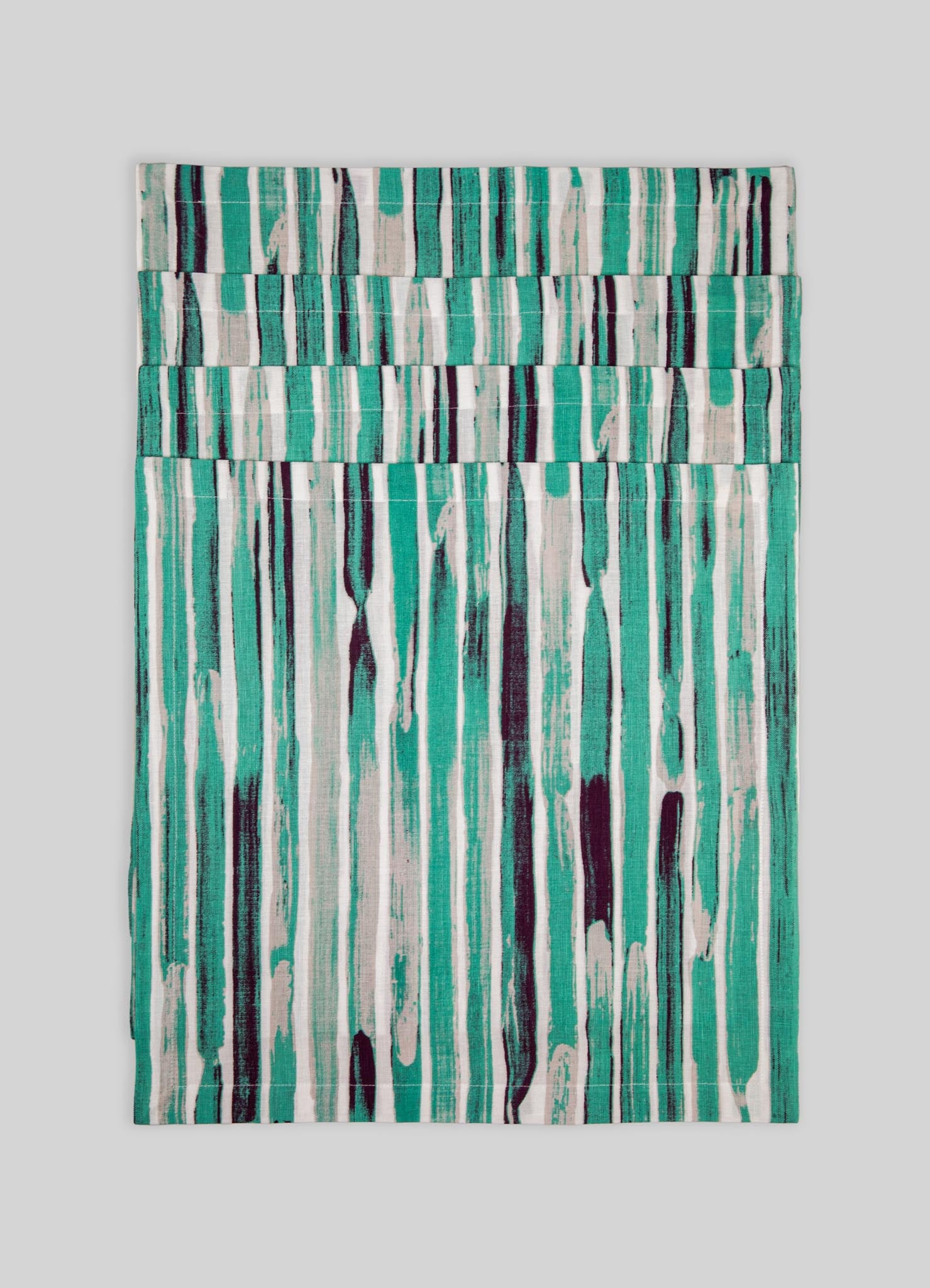 Textile with an abstract vertical stripe pattern in shades of teal, black, and white, resembling a modern or contemporary style. The fabric appears lightweight, suitable for use as a curtain, wall hanging, or decorative textile.