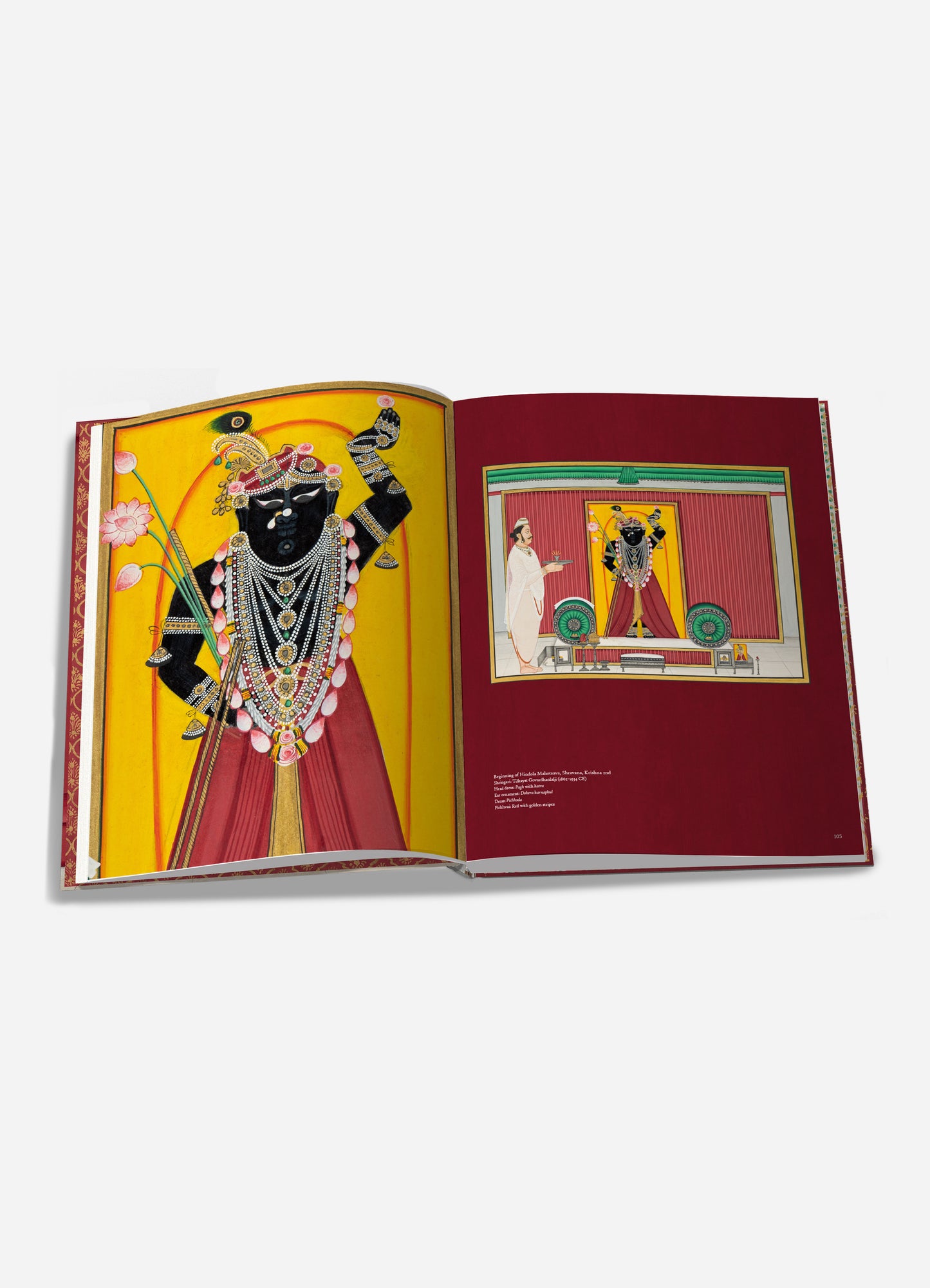 This image shows an open book with colorful illustrations of traditional Indian art, featuring a figure adorned with jewelry and clothing on a yellow background. The right page displays a scene with a similarly dressed figure on a stage with red and teal curtains, and a person in white clothing standing nearby.