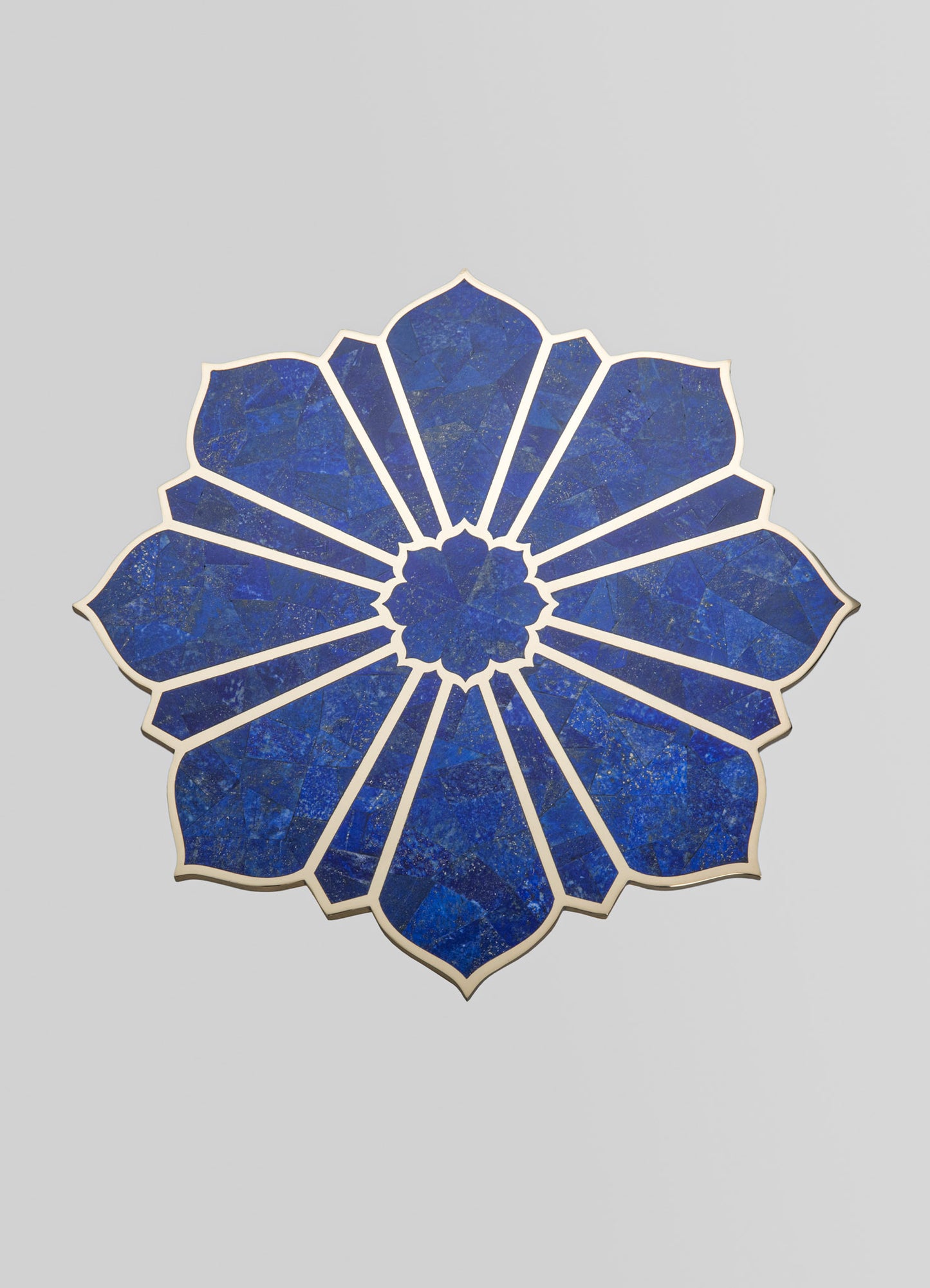 Decorative wall art featuring a geometric floral motif with deep blue and gold-toned accents, outlined by a metallic border. The design combines contemporary and traditional elements with a bold, symmetrical pattern.
