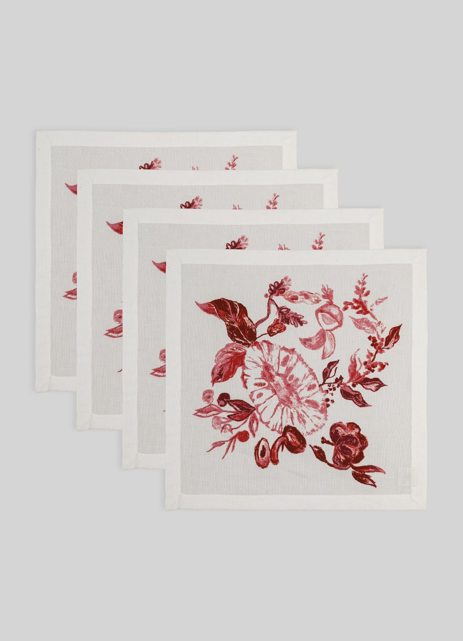 Set of five white napkins featuring a red botanical and floral pattern, made from paper or fabric with printed or embroidered design, suitable for table setting or decorative use.