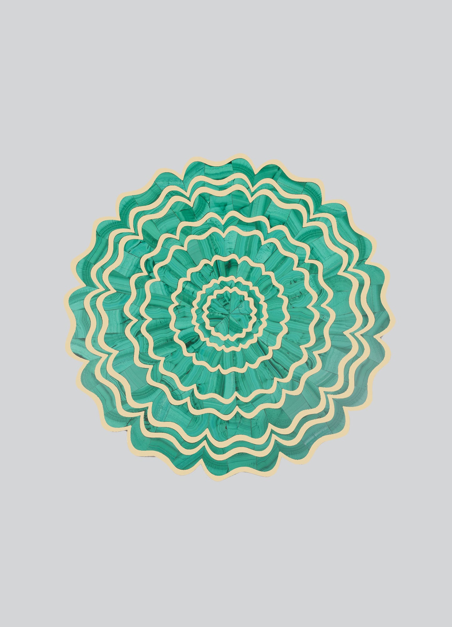 A decorative wall art piece made of layered wood with a circular, floral-inspired pattern in shades of teal. The design features wavy edges and concentric rings creating a vibrant, handcrafted aesthetic.