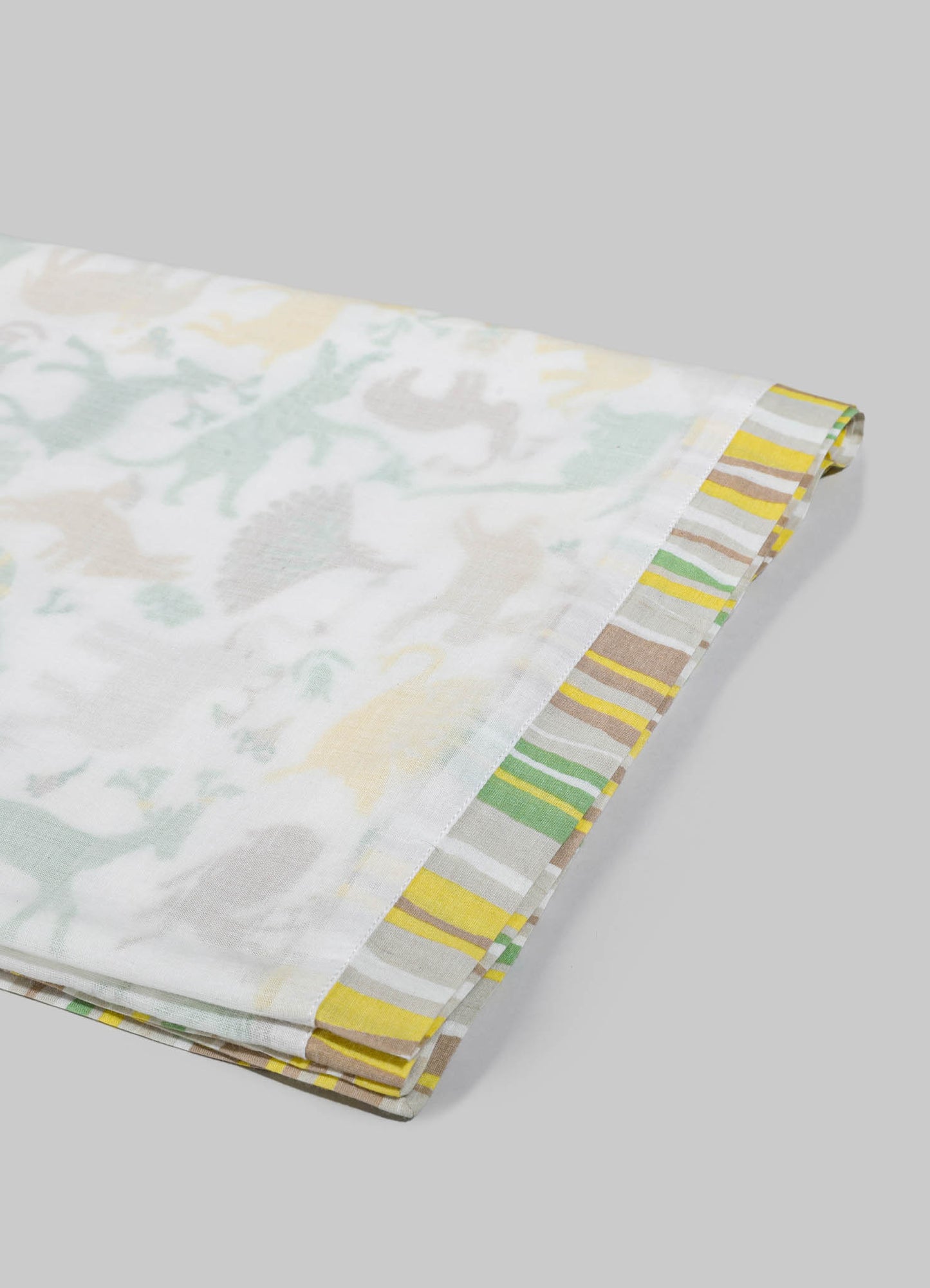 A set of fabric napkins featuring a light, pastel floral pattern with soft green, beige, and yellow tones, edged with a striped border in yellow, green, beige, and white.
