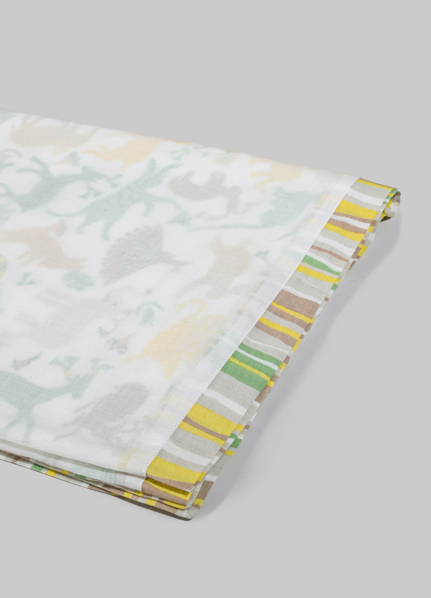 A set of fabric napkins featuring a light, pastel floral pattern with soft green, beige, and yellow tones, edged with a striped border in yellow, green, beige, and white.