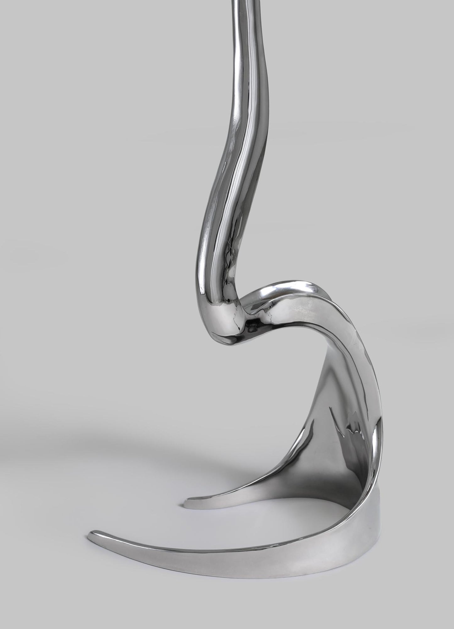 Metallic horse bit on a gray background viya designer luxury table lamp