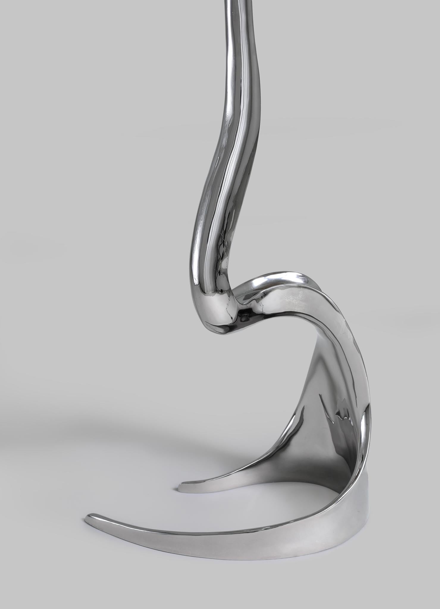 Metallic horse bit on a gray background viya designer luxury table lamp