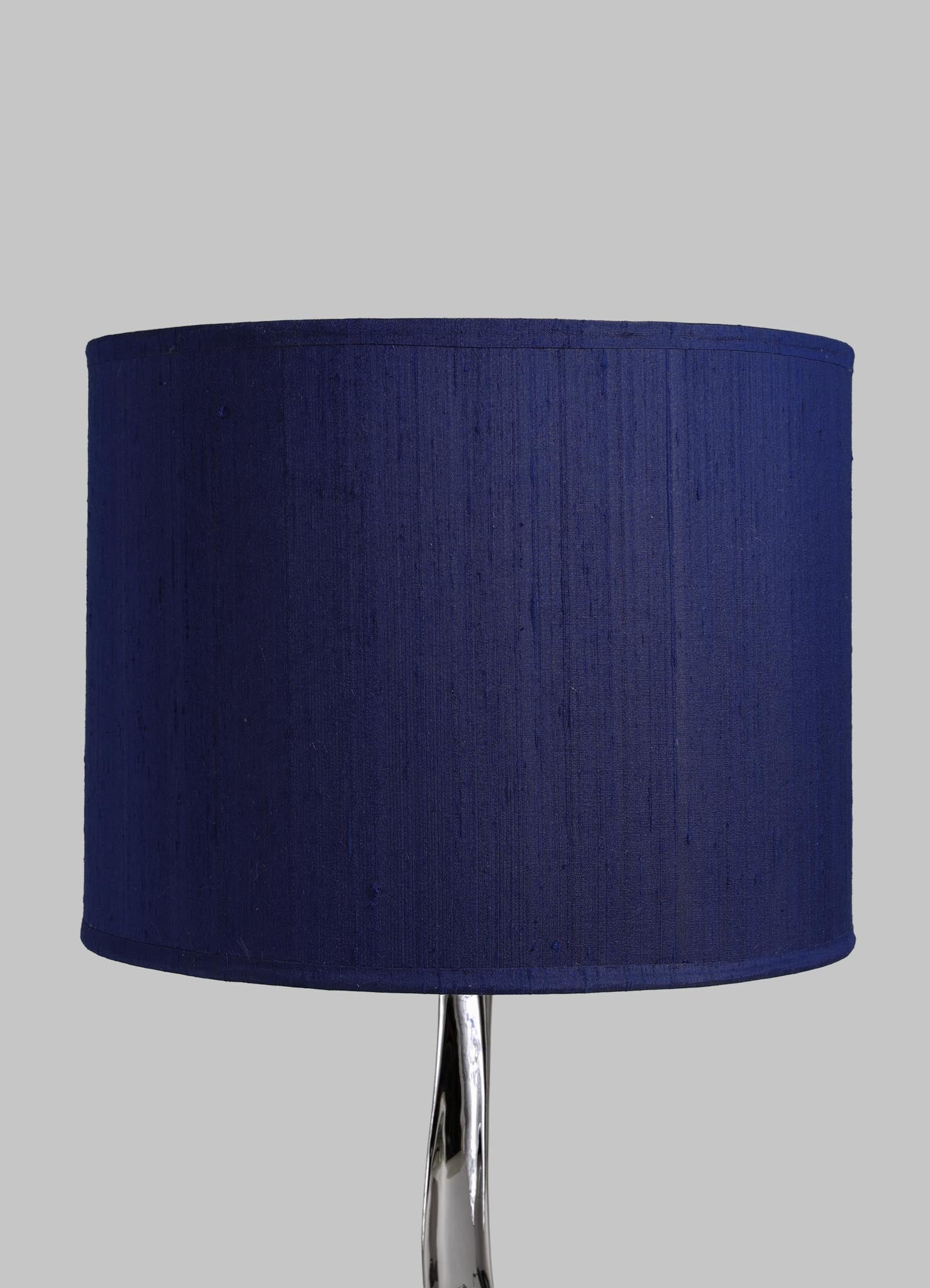 Navy blue lampshade on a gray background viya designer luxury table lamp