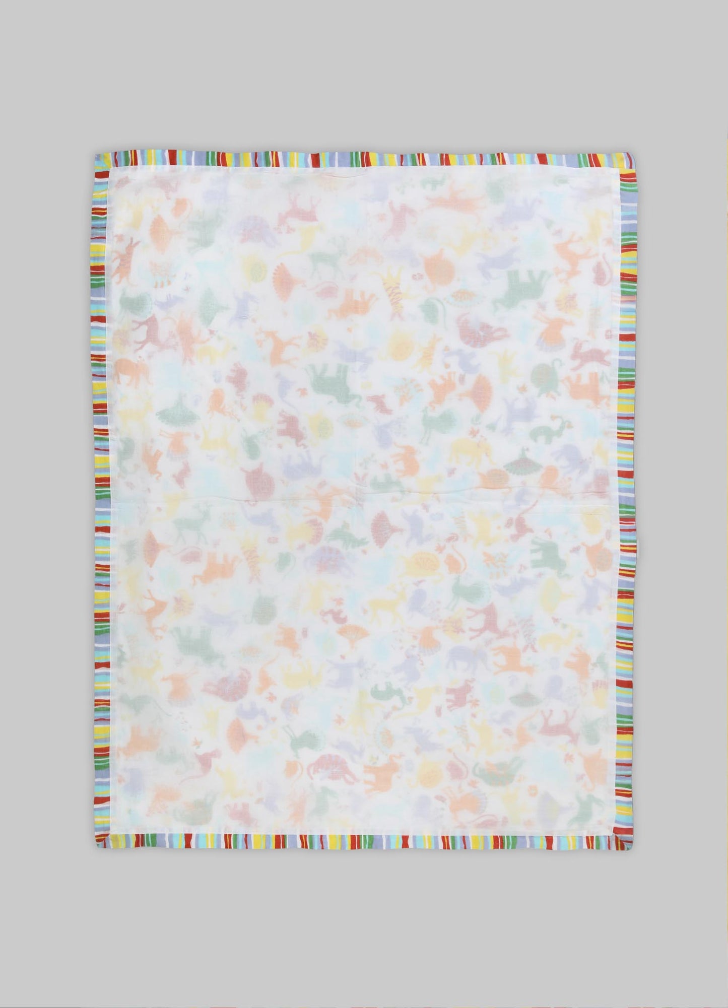 A lightweight baby blanket with a pastel animal print featuring dinosaurs, bordered with colorful striped trim.