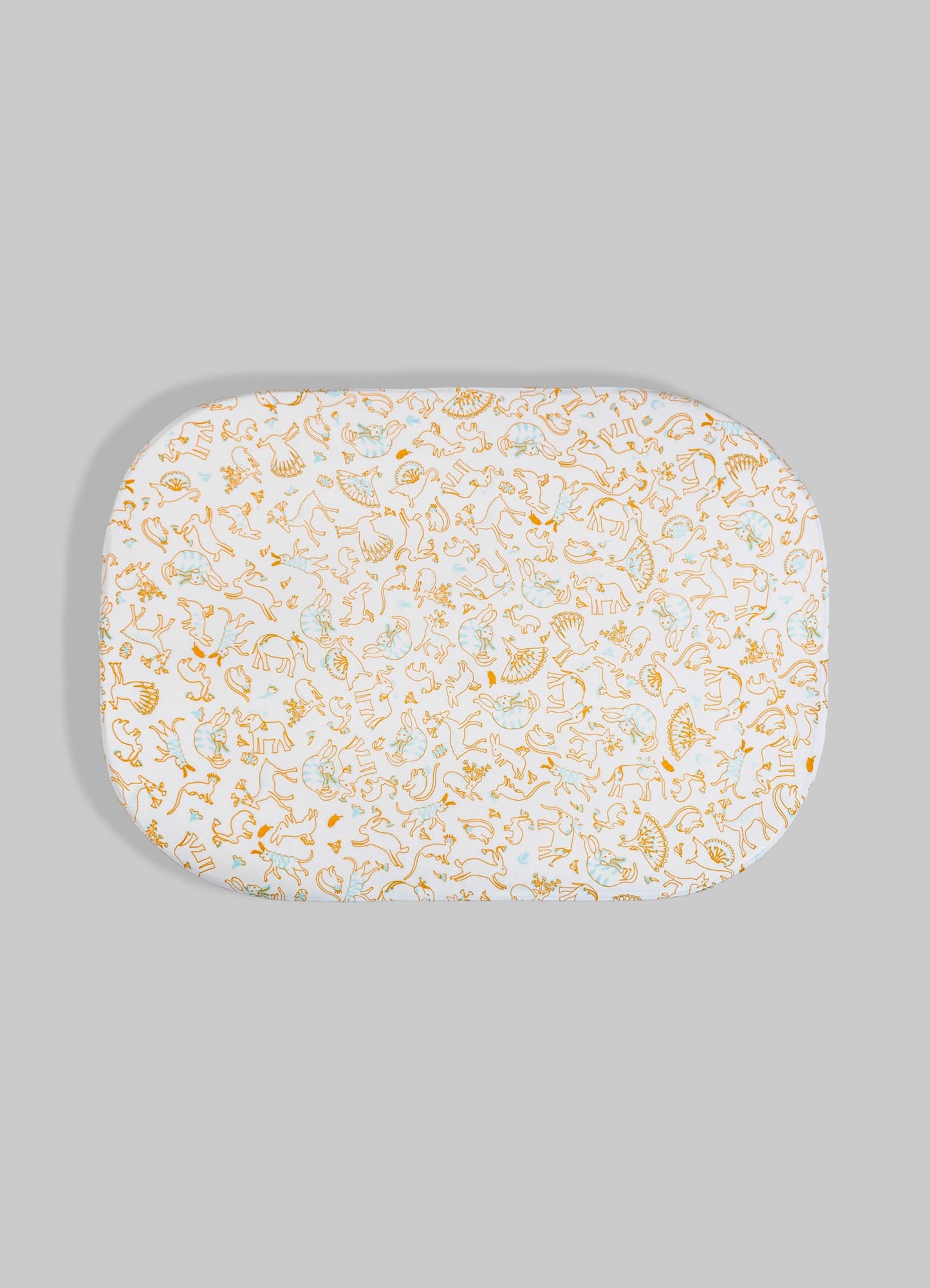 Oval ceramic platter with a white background and a pattern of orange and light blue line drawings of animals and fans, featuring a whimsical design.