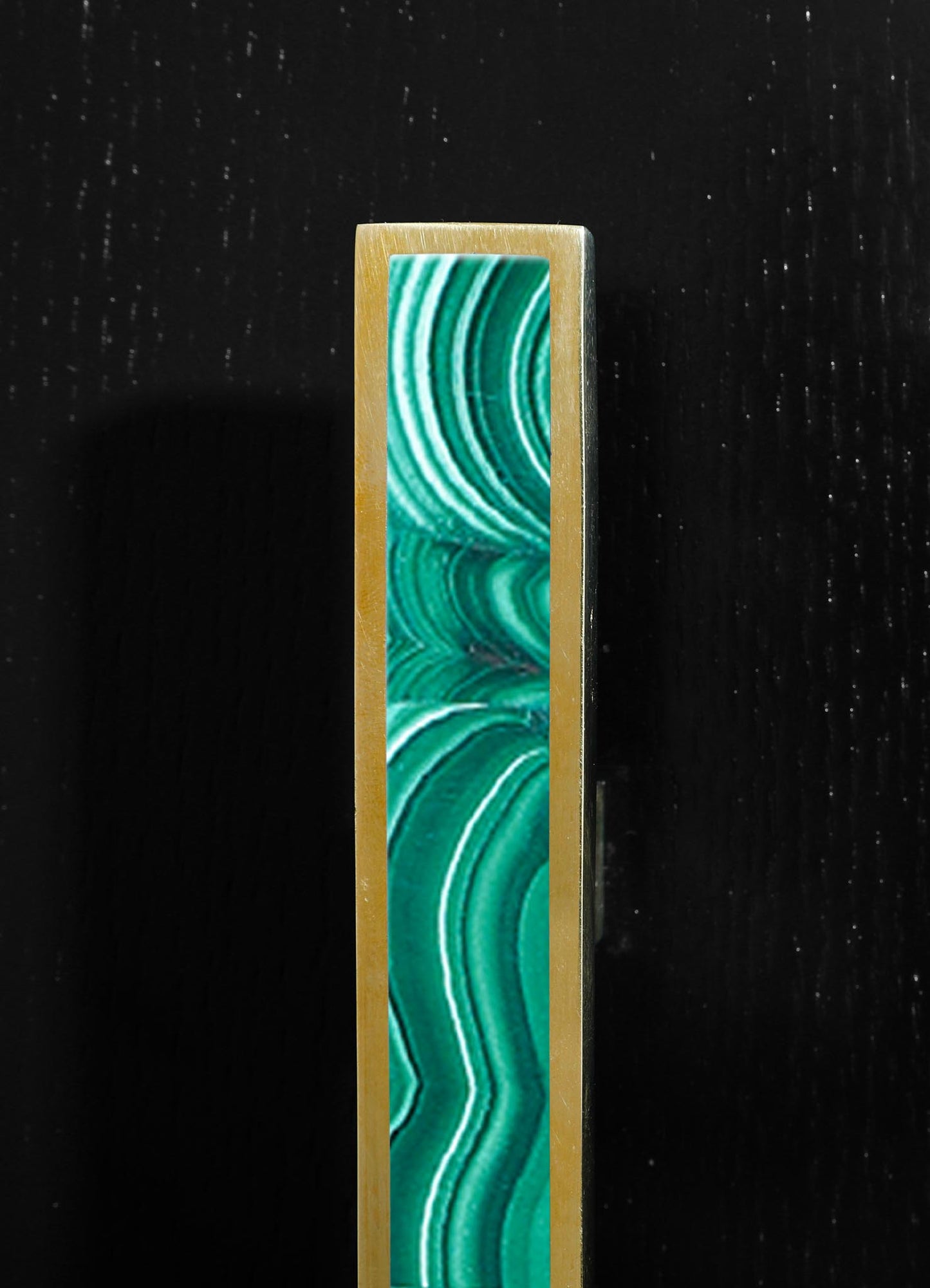 A rectangular candle holder made of wood with a large turquoise marbled insert featuring swirling patterns. The design combines natural materials with vibrant, bold color.
