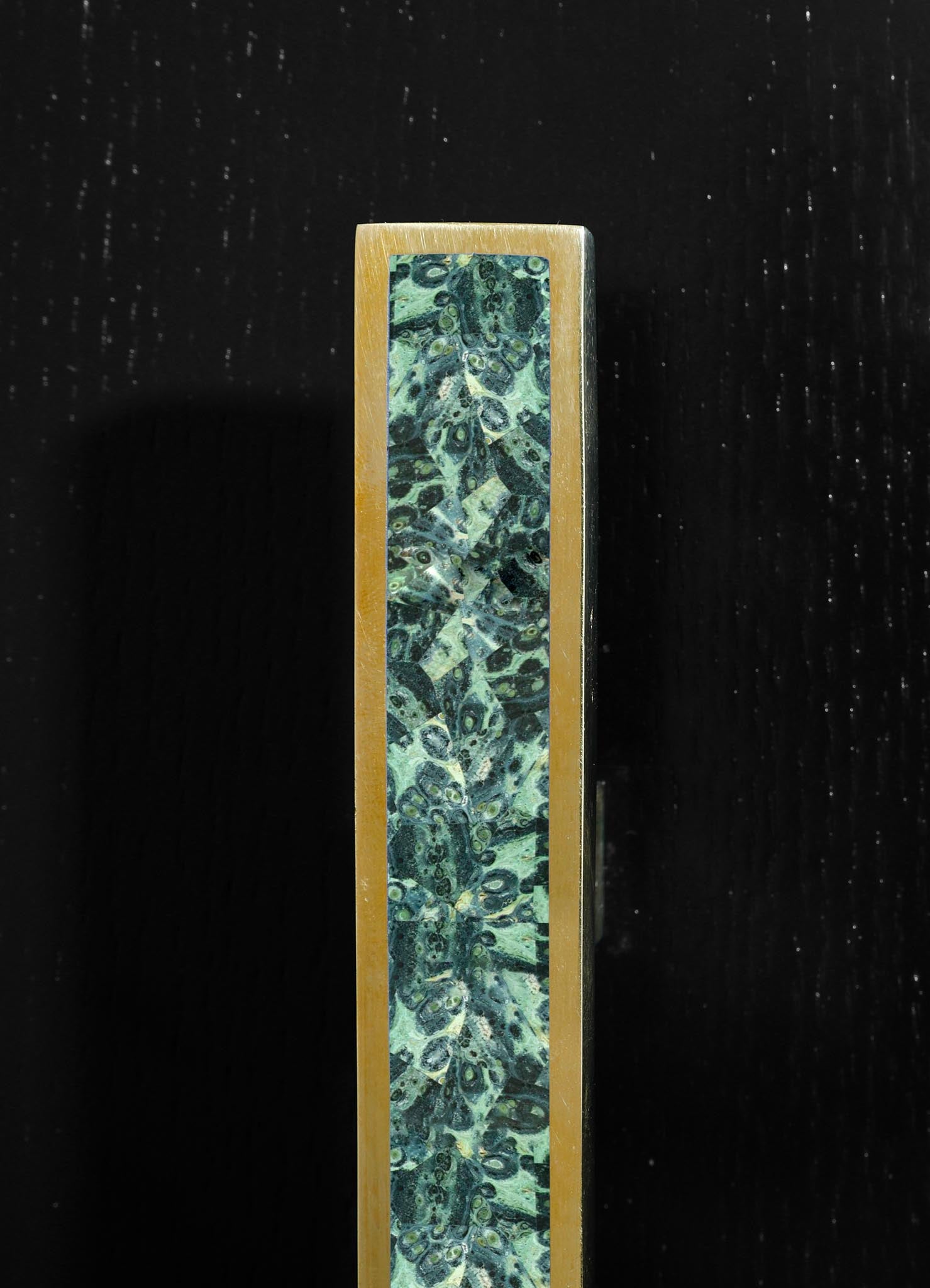 stone handle with brass inlay