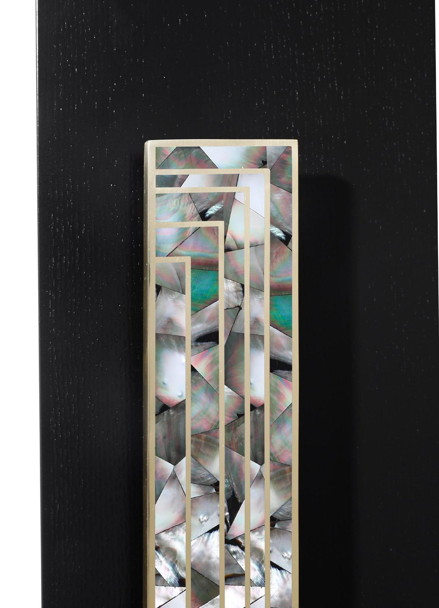A decorative panel with a gold frame featuring an iridescent shell motif, designed with vertical lines and geometric shapes. The panel has a contemporary style with a luxurious, shiny finish.