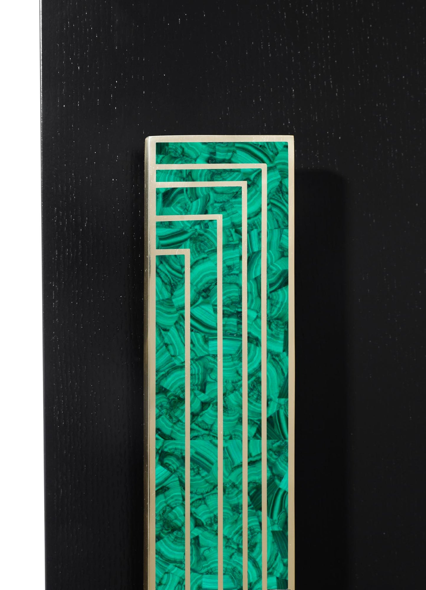 Decorative panel with a geometric pattern featuring layered rectangular shapes in a vibrant green malachite resin with metallic silver framing, mounted on a black textured surface.