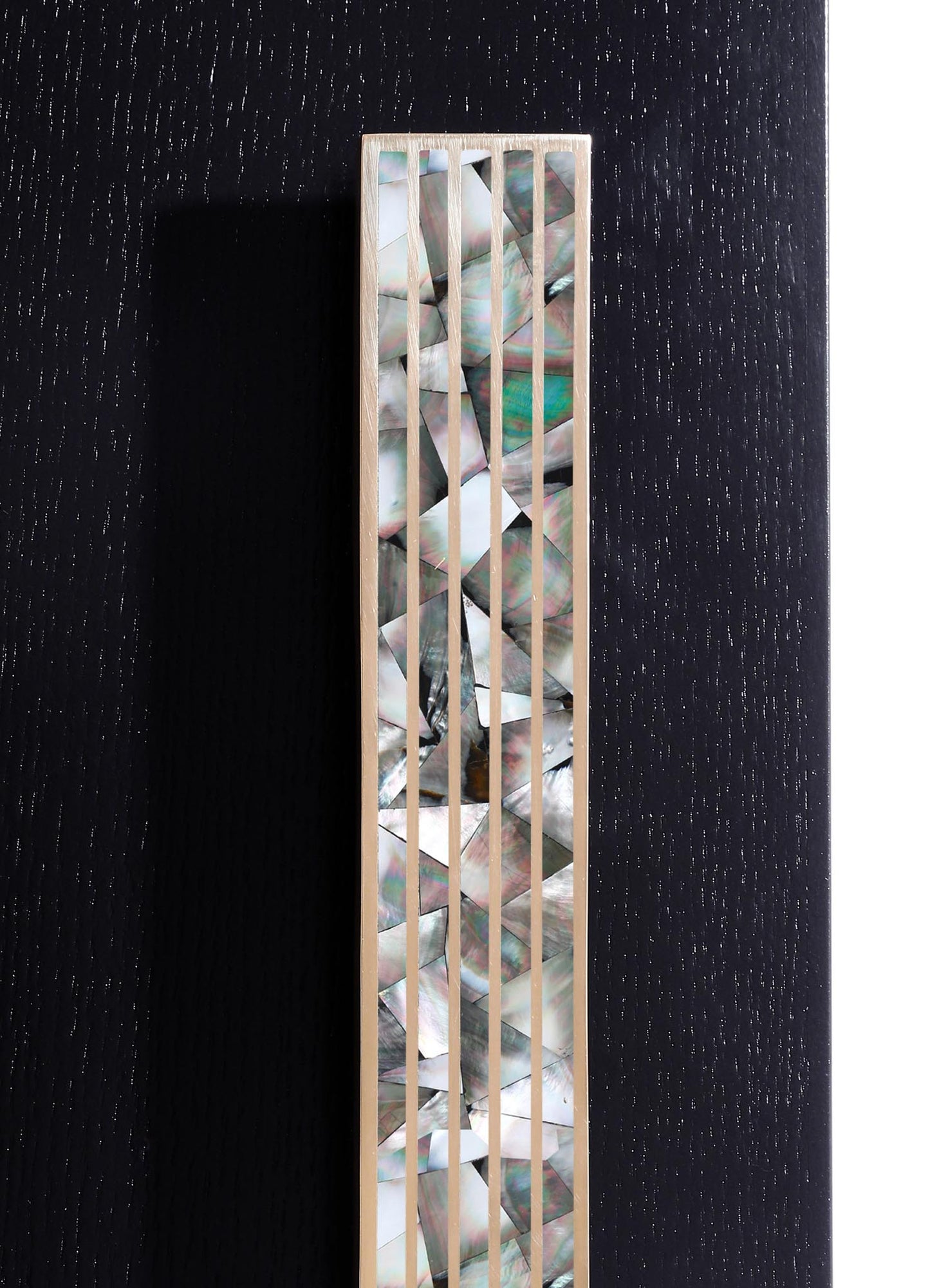 A tall decorative object featuring a rectangular frame with horizontal wooden slats and a mirrored interior surface with an iridescent, mother-of-pearl effect, set against a dark textured background.