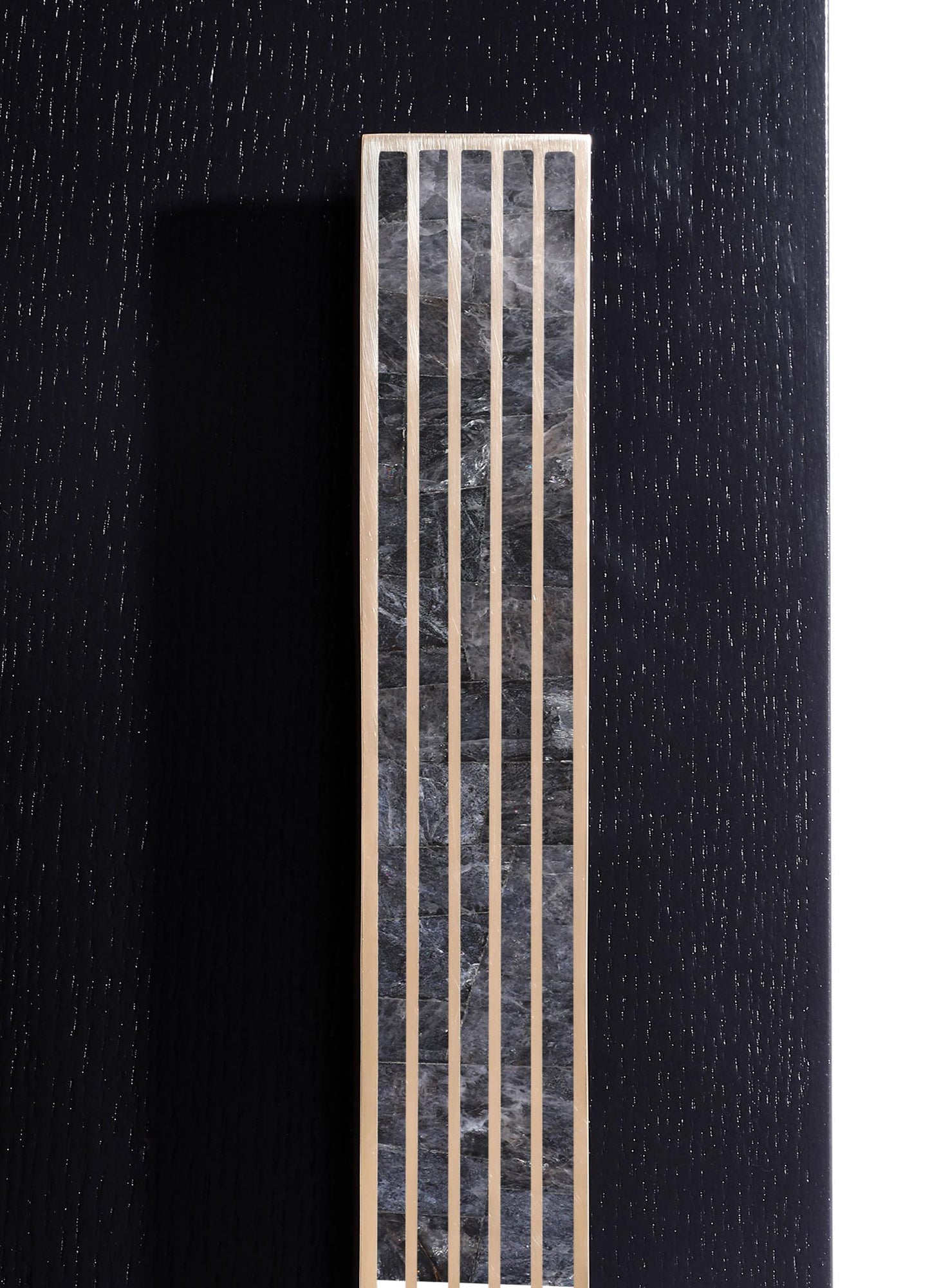 A decorative wall panel featuring a rectangular black marble insert with natural veining, framed by light-colored wood with evenly spaced vertical slats, creating a modern, minimalist design.