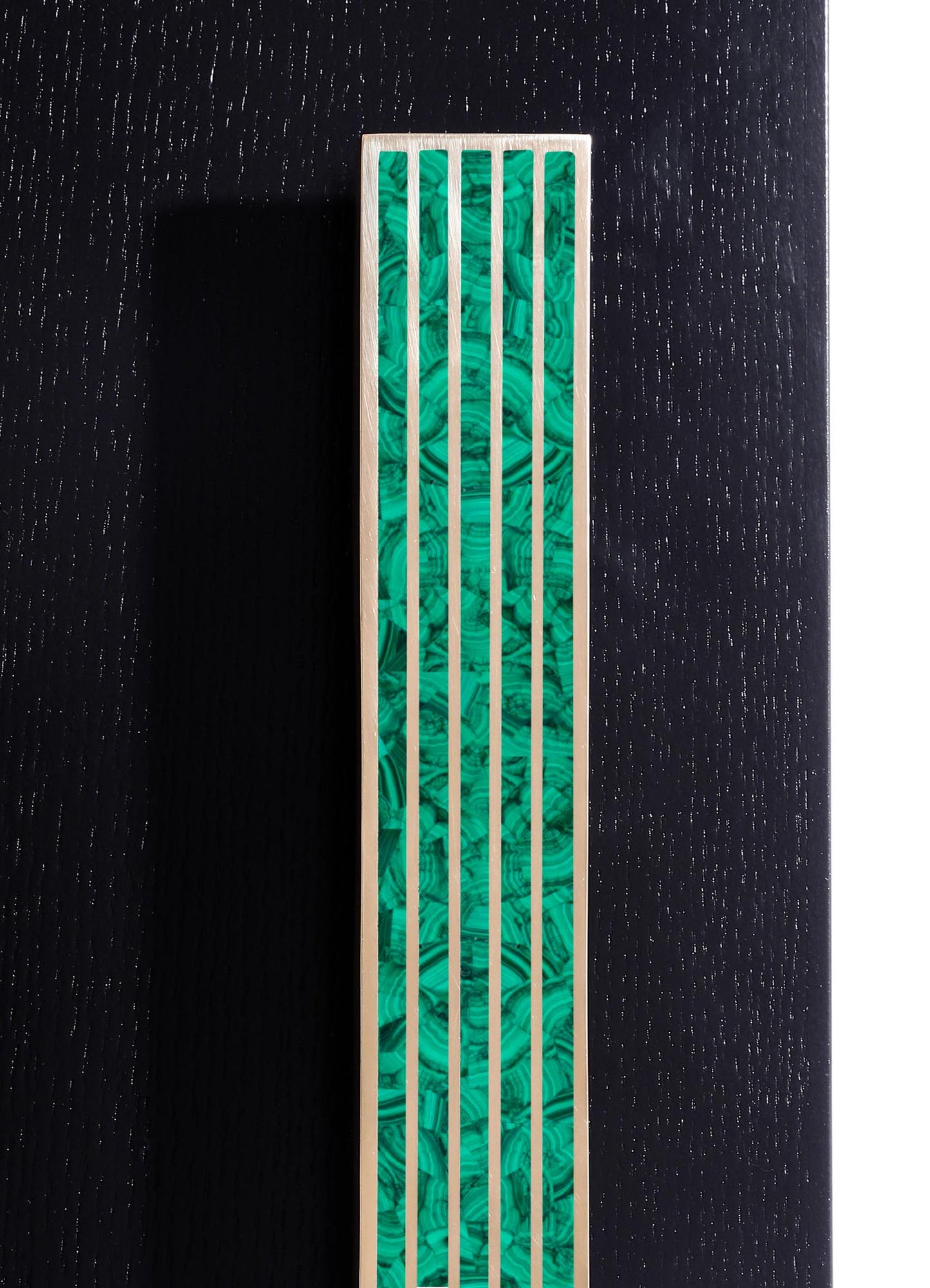 A decorative wall panel featuring a rectangular wooden frame with vertical slats, filled with an inlay of green malachite stone arranged in a symmetrical, swirling pattern.
