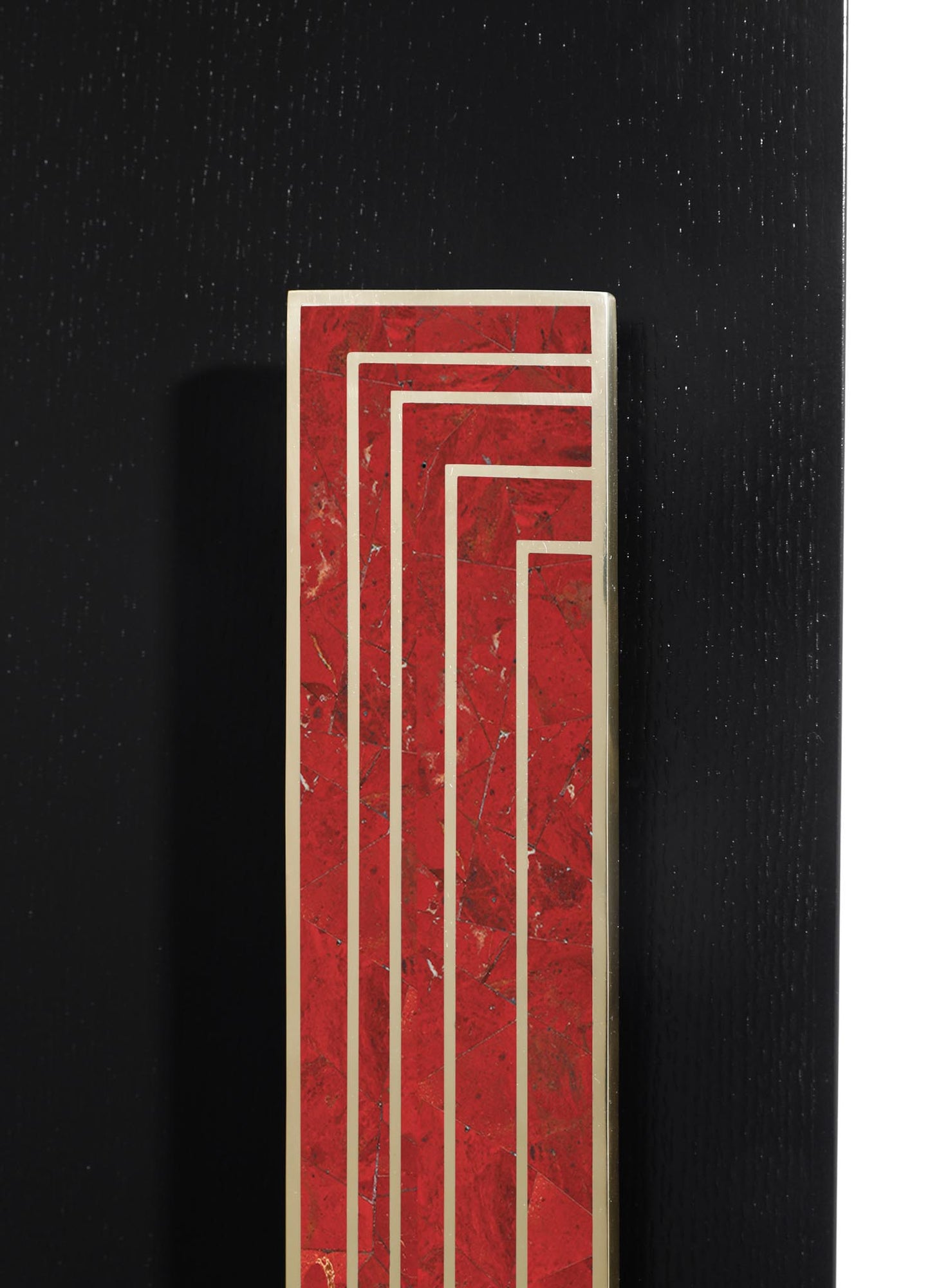 A tall, rectangular decorative panel featuring a red marble surface with gold diagonal and vertical lines creating a geometric pattern. The panel has a beige or cream-colored border and is mounted on a black textured background.
