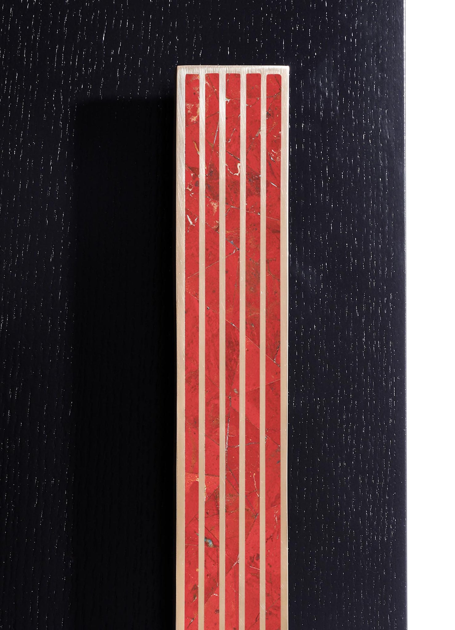 A rectangular ceramic tile with a bold red and marble pattern, featuring vertical white stripes. The tile has a glossy finish and is mounted on a black textured surface.