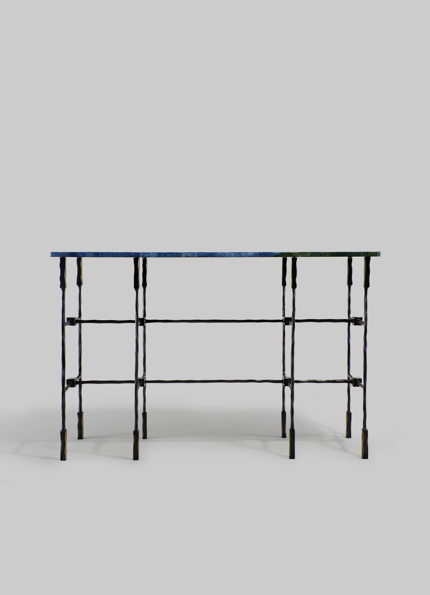 A metal table with a dark finish featuring a minimalist design and a rectangular glass top. The table has a slender, industrial-style frame with vertical supports and horizontal crossbars.