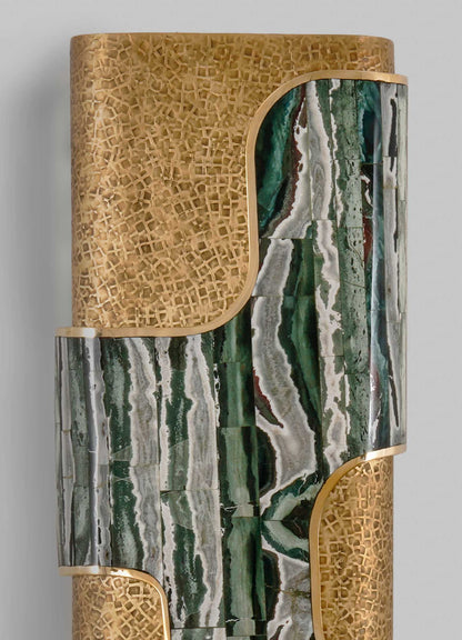 A decorative cabinet featuring a combination of green, white, and brown marble with bold natural veining, accented by gold-colored metal edges and a honeycomb-patterned wooden panel on top. The style is modern with luxurious details and organic motifs.