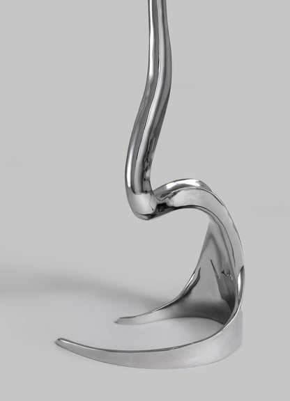 Metallic horse bit on a gray background viya designer luxury table lamp