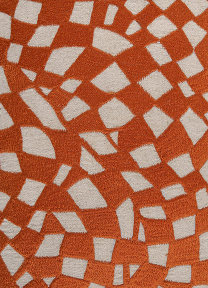 Close-up of Viya’s Dreamscape Orange Embroidered Checks Cushion Cover (12"x18"), featuring an abstract orange and white geometric pattern with a soft, plush texture that evokes intricate embroidered motifs.