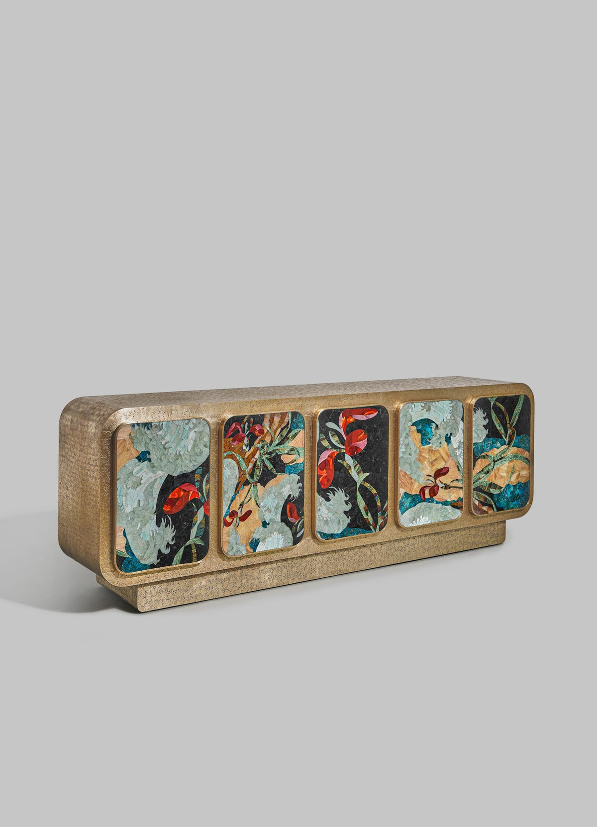The Gardens Of India Cabinet by VIYA is a rectangular gold sideboard with four square doors, each adorned with vibrant floral and bird designs inspired by Indian garden blossoms on a dark background.