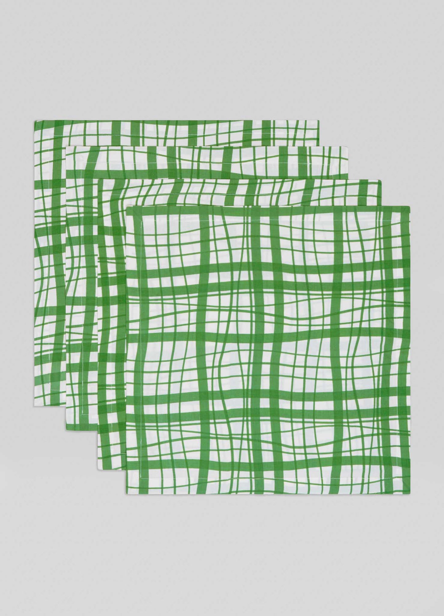 Add elegance to your table with the Viya Madras Check Green Napkins—set of 4. Featuring bold green checks, these white napkins bring a touch of Indian-inspired style to any contemporary collection.