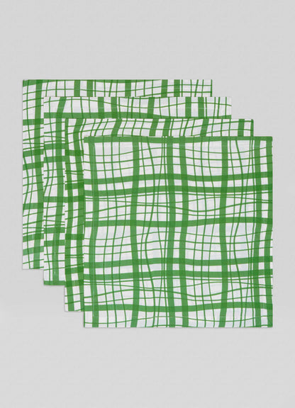 Add elegance to your table with the Viya Madras Check Green Napkins—set of 4. Featuring bold green checks, these white napkins bring a touch of Indian-inspired style to any contemporary collection.