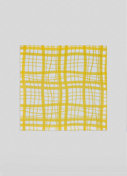 The Viya Madras Check Yellow Napkins (Set of 4) are square, white cloth napkins with yellow Madras-style irregular plaid checks, shown flat on a light gray background.