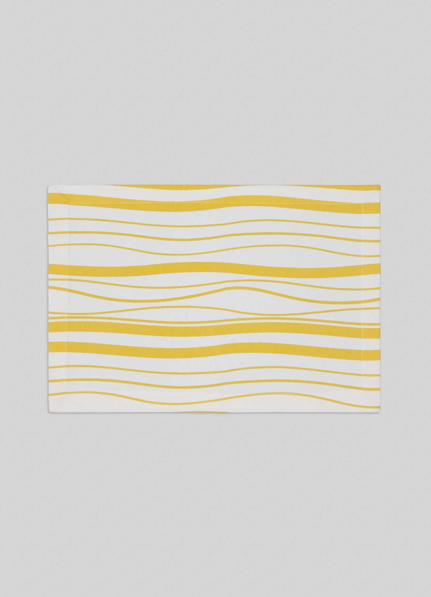 The Viya Madras Check Yellow Placemats (Set of 4) feature a white background with evenly spaced yellow wavy lines, blending contemporary style with traditional Indian textile design.