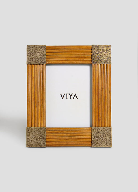 The VIYA Namsai Photo Frame Large is a rectangular wooden frame with vertical grooves and textured metallic corners, featuring a central placeholder paper labeled "VIYA" against a plain light background.