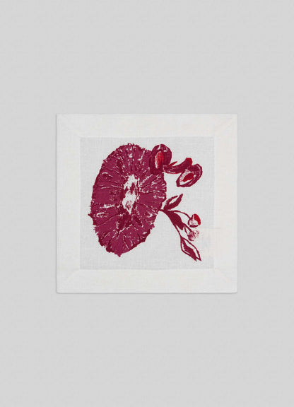 The Orchard Red Cocktail Napkins by Viya are white napkins featuring detailed deep red Indian pomegranate embroidery, shown on a light grey background. Available as a set of 4.