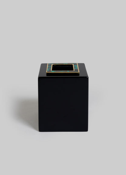 The VIYA Rivoli Cube Tissue Box features a glossy black finish and gold-accented rim, capturing Art Deco Bombay cinema elegance, set against a plain light gray background.