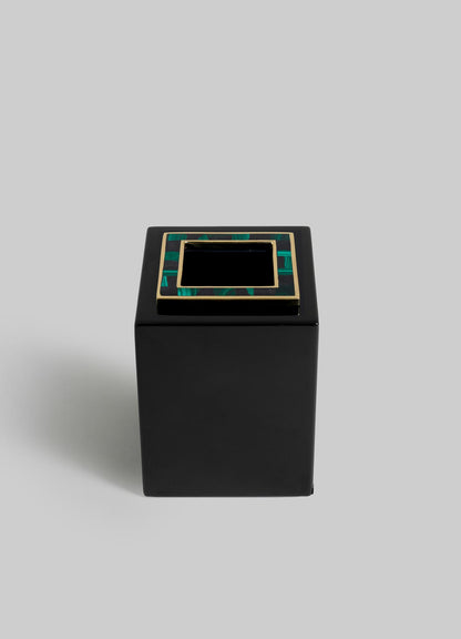 The VIYA Rivoli Cube Tissue Box features a sleek black rectangular design with a square top opening, adorned with gold and green Art Deco patterns inspired by classic Bombay cinema halls, set against a light gray background.