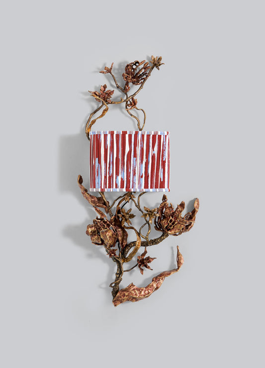 The VIYA "Spring In Kashmir Wall Sconce A" features red and white vertical stripes atop twisted, dried brown vines and flowers—an artistic touch of Kashmir decor for your home, shown on a plain gray background.