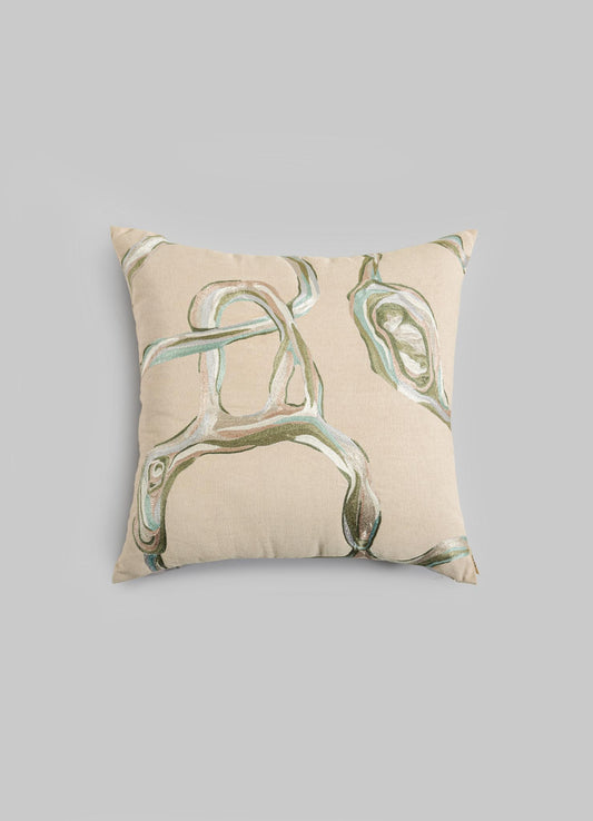 The Viya Tutti Frutti Sea Green Cushion Cover 18"x18" features an abstract green and brown pattern on beige, inspired by Cartier Tutti Frutti hand-embroidered designs, and is shown against a plain light gray background.
